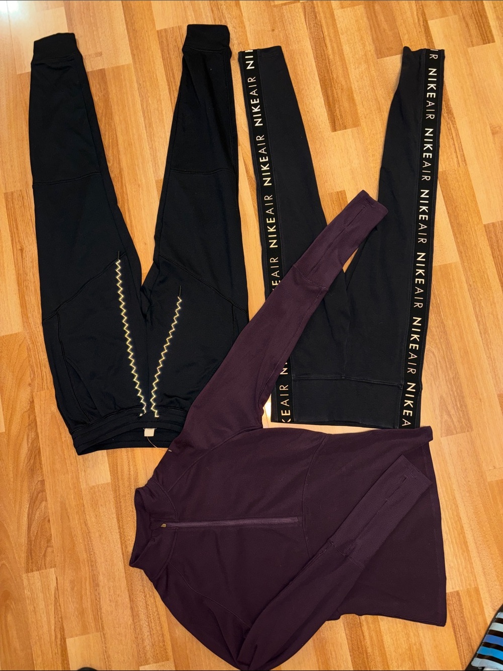 Nike Black Leggings with White Logo Tape and Gold Zigzag Detail